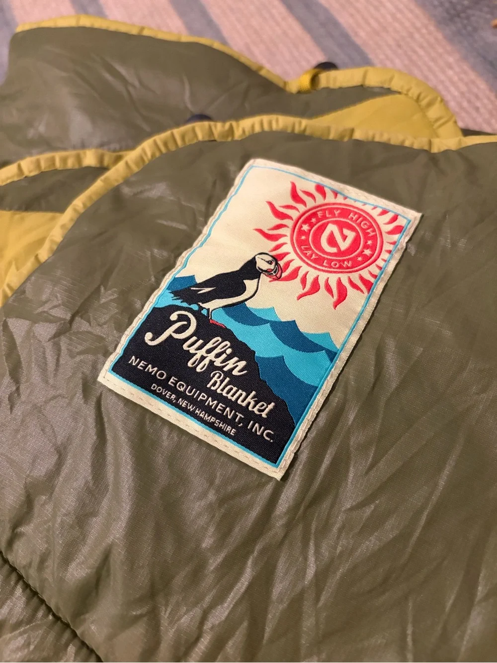 Nemo Equipment Puffin Blanket in Olive and Lime Reversible Quilted camping
